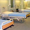 Beds in hospital ward