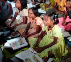 School girls attending class