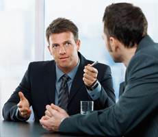 Two businessmen in a meeting