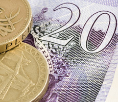 British pound note and coins