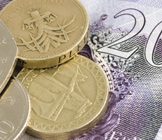 British pound note and coins