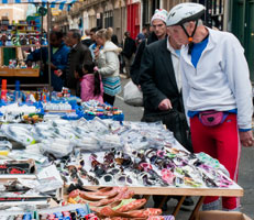 People looking at a market stall