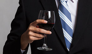 Man holding a glass of wine