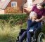Lady in wheelchair with carer