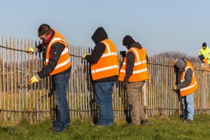 Men putting up a fence