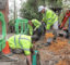 Workmen laying cables