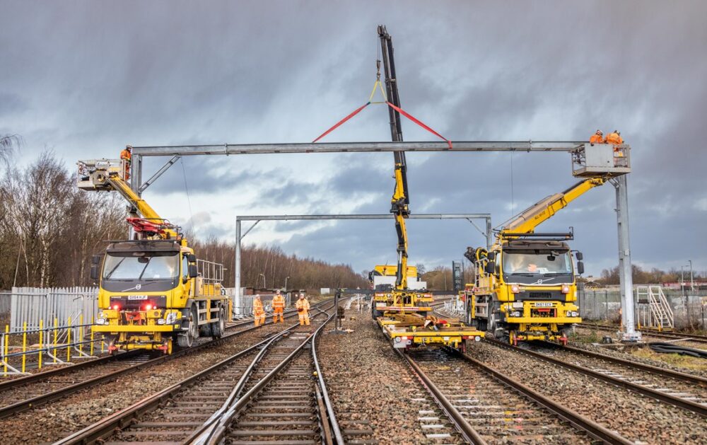Yellow engineering machinery on railway tracks