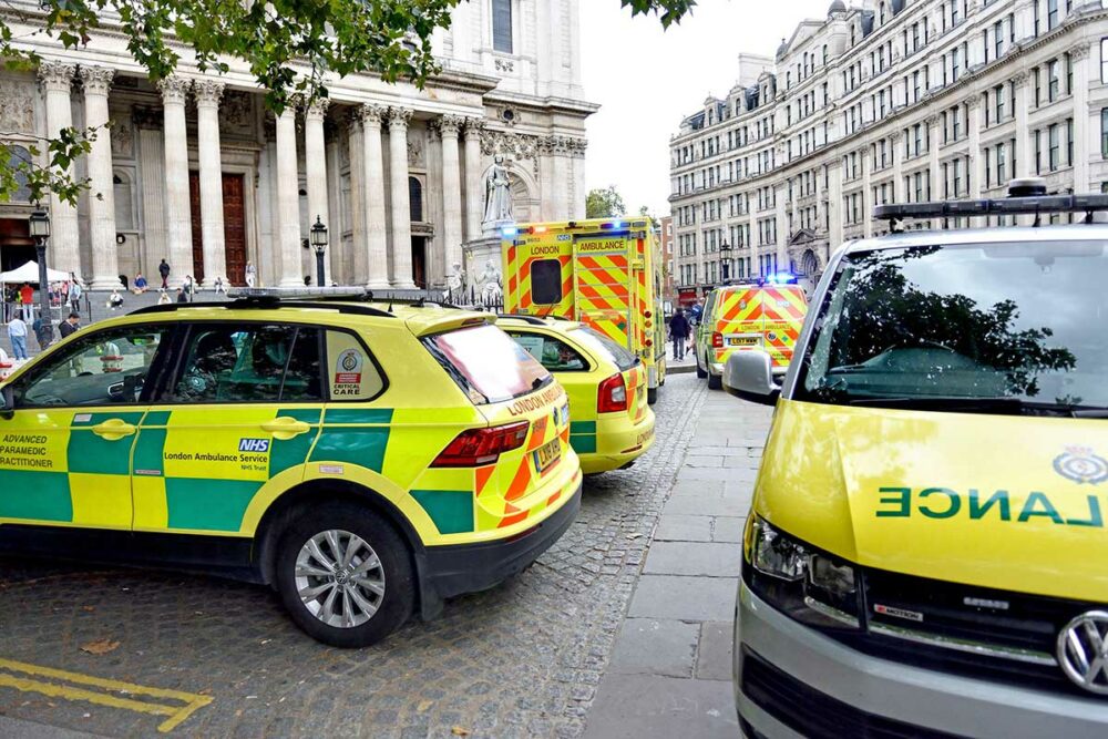 Emergency vehicles parked on a street