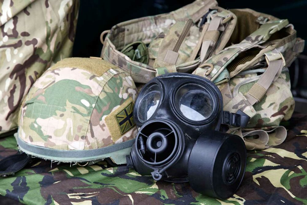 Military helmet, gasmask and backpack