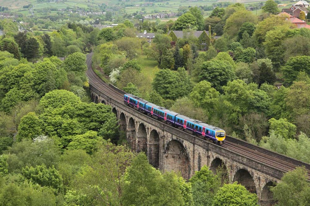 A train crossing the viaduct at Brownhill, Dobcross, heading for Manchester.